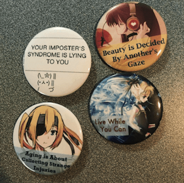 Several buttons showing different quotes and artwork paired together.
